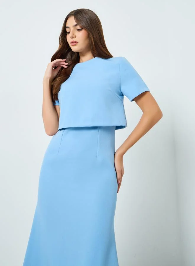 ستايلي فستان طويل بحافة واسعة وأكمام قصيرة